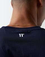 Navy core T-shirt back close-up with 11° logo at neckline