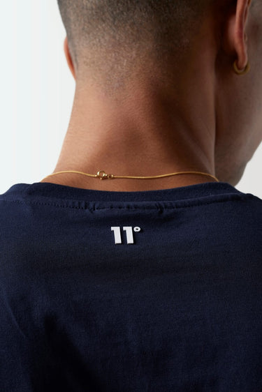 Navy core T-shirt back close-up with 11° logo at neckline