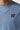 Men's blue crew-neck T-shirt with small black chest logo