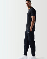 Black crew-neck muscle-fit T-shirt with '11' logo, side profile view.