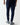Navy slim-fit joggers shown from behind with tapered ankle cuffs and leg seams