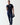 Navy slim-fit joggers with elastic cuffs and drawstring waist, side seam pockets
