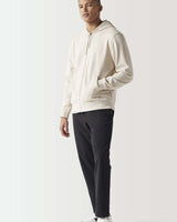 Light beige full-zip hoodie with drawstring hood and front pockets