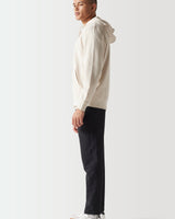 Light beige full-zip hoodie, side view with drawstring hood and cuffs