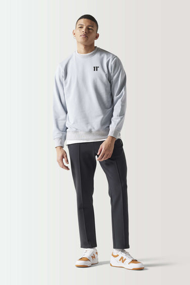Light gray crewneck sweatshirt with small '11°' logo at chest