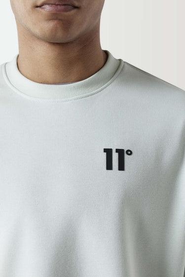 Glacier green crewneck sweatshirt with black 11° logo at center chest