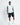 Black sweat shorts, knee-length with small thigh logo detail