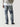 Mid-blue ripped jeans with knee rips and distressed wash