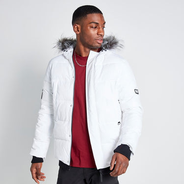 White padded jacket with fur-trimmed hood and front zipper, worn open at chest