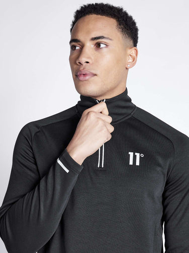 Black quarter-zip top with zipper placket and sporty logo on chest