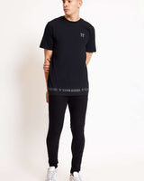 Black crew-neck t-shirt with 3D chest logo and branded hem strip