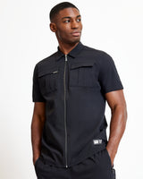 Black utility short-sleeve shirt with full front zipper and chest flap pockets