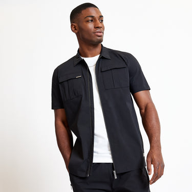 Black utility short-sleeve shirt, front zipper and two chest flap pockets detail