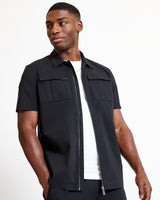 Black short-sleeve utility shirt with open collar, zip front, and flap chest pockets