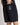 Black mesh shorts with small front logo patch and side seam pockets