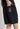 Black mesh shorts with small front logo patch and side seam pockets