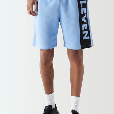 Light blue sweat shorts with elastic waistband and black ELEVEN logo side tape