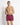 Maroon micro taped swim shorts with elastic waistband and side taping.