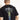 Black T-shirt back graphic with colorful world map and script