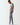 Charcoal marl skinny-fit joggers, full-length with tapered leg and white sneakers