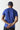 Cobalt space-dye T-shirt back view with small 11° logo near collar