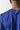 Cobalt space-dye T-shirt neckline detail with 11° logo on the chest