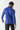 Cobalt long-sleeve quarter-zip pullover, back view with subtle space-dye texture