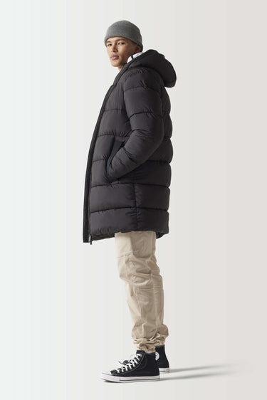 Black longline puffer jacket, side profile with quilted padding and hood