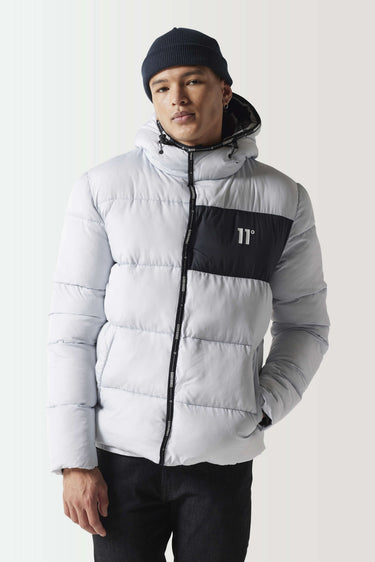 Micro puffer jacket with black chest panel, hood, full zip; gray and white quilting