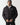 Black panel puffer jacket with full-zip front, standing collar, and chest logo