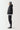 Black overhead hybrid jacket with hood, side profile, full zipper and quilted design