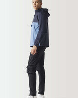 Navy and light blue color-block hooded pullover jacket, side view