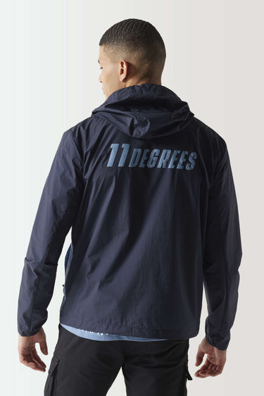 Navy hooded pullover jacket with large '11 DEGREES' print on back
