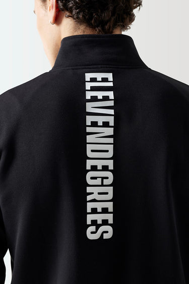 Black full-zip sweat top back with vertical “ELEVEN DEGREES” logo text