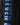 Black hoodie close-up of tall blue gradient logo-style print.