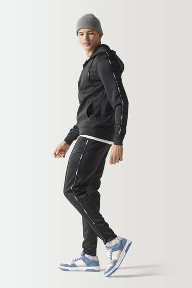 Black full-zip hoodie with hood and front zipper, side profile view
