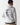 White hoodie back view with large graphic text and map-style layout.