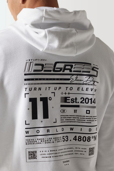 White hoodie back print close-up with large graphic, numbers, and barcode area.
