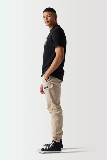 Black crewneck t-shirt with front graphic, short sleeves; side profile