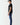 Black crew-neck T-shirt with short sleeves, side view
