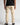 Cool sand chino trousers, full-length front view with straight legs