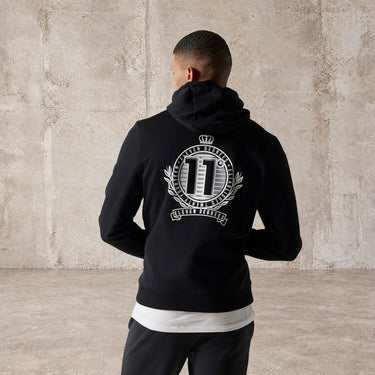 Black hoodie with large crest logo graphic on back, front pouch pocket and hood