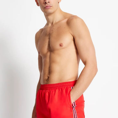Red swim shorts with white side stripe tape and small white logo