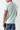 Men's fitted crewneck T-shirt, light glacier green, small back logo detail.