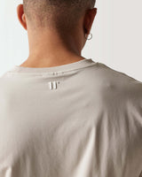 Cool sand men's core muscle fit t-shirt, back view with small neck logo