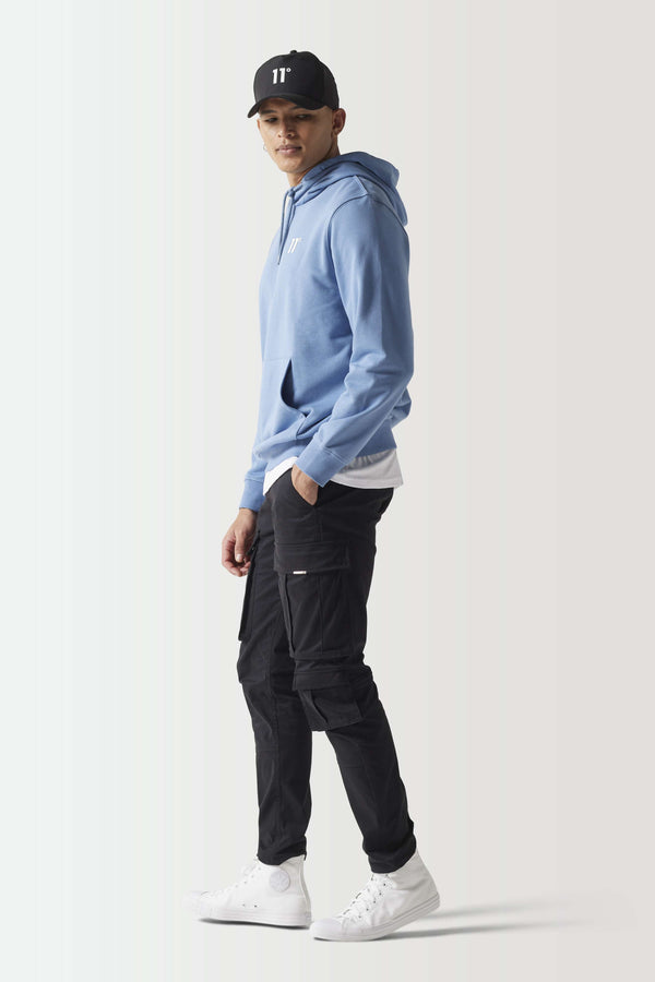Light blue pullover hoodie with drawstring hood, 11° chest logo, and long sleeves
