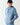 Light blue hoodie with drawstring hood and front pocket, worn front