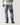 Mid-blue ripped jeans with knee rips and distressed wash