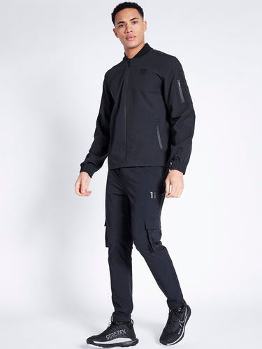 Model Wearing 11 Degrees Black Krypton Cargo Pants