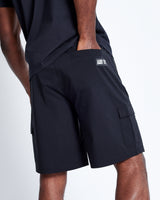 Black utility shorts with side cargo pocket and small logo label at hem